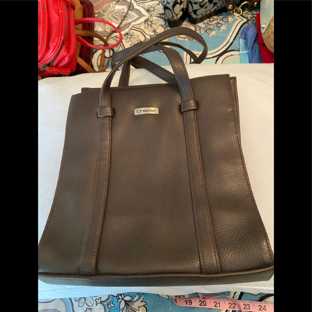 Brown soft leather type great carry lots ofthings